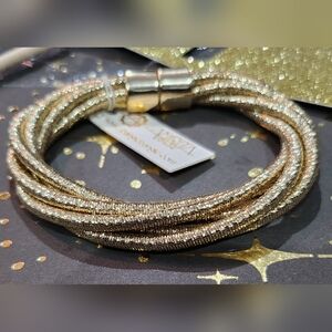 208. Goldtone magnetic closure bracelet